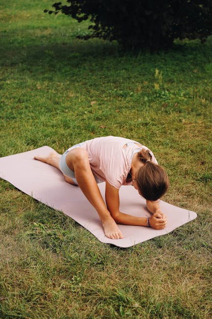 A person hesitantly stepping onto a yoga mat for the first time